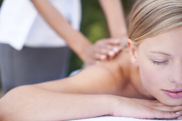 Woman, masseuse and therapist to relax, back and spa for treatment and stress relief therapy. Sleeping, massage and wellness in resort, peaceful and hands for luxury, body care and tranquility