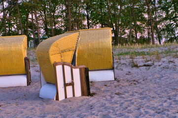 Beach chair on the beach at Zingst on the Baltic Sea. Trees in the background. Landscape shot on...