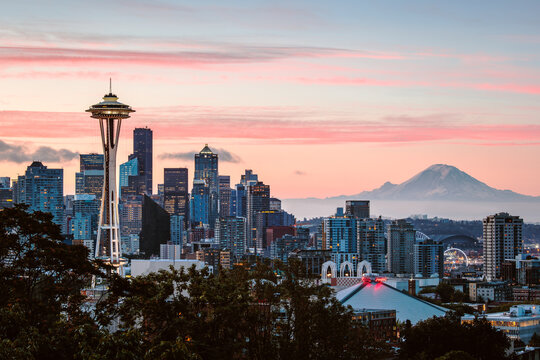 City skyline at dawn with Space Needle and Mt Rainier, Seattle, United States