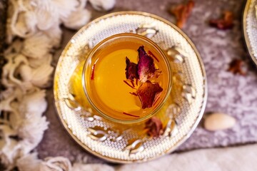 Top view of Kahwa,a traditional Kashmiri herbal tea made from Green tea,saffron,cinnamon,almonds....