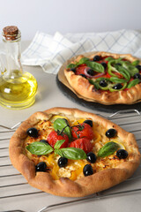 Freshly baked vegetable galettes on a metal tray