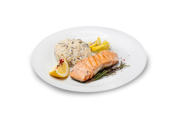 Grilled salmon steak with rice and onions on a plate, isolated