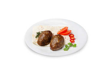 Homemade meat cutlets in a plate, isolated