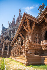 Naklejka premium Sanctuary of Truth wooden temple in Pattaya Thailand is a gigantic wood construction located at the cape of Naklua Pattaya City. Sanctuary of Truth temple. 