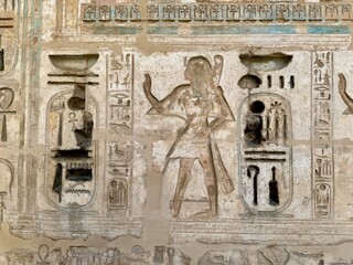 detail of the ancient Egyptian wall with hieroglyphs 