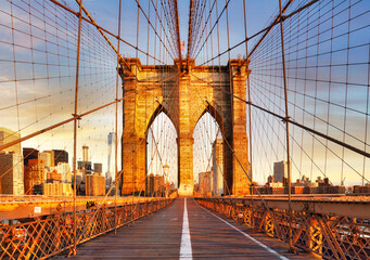 Fototapeta premium Brooklyn Bridge, New York City at dramatic sunrise, nobody