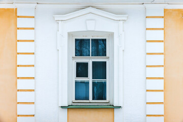 Fototapeta premium Classic architecture details, background photo texture. Window