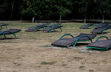 empty wooden sun beds