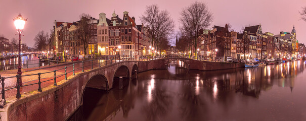 Fototapeta na wymiar Panorama of Amsterdam canal Keizersgracht with typical dutch houses at night, Holland, Netherlands