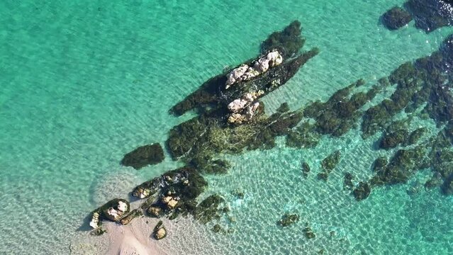 Beautiful turquoise waters seen from above on the coast of the Mediterranean Sea. 
