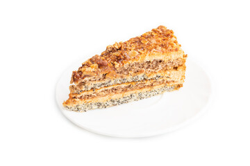 Walnut and hazelnut cake with caramel isolated on white. side view