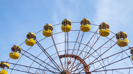 cabins old carousel wheel in an abandoned amusement park in Chernobyl © Sofiia