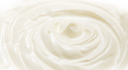 Sour cream or greek yogurt swirl texture, White cream background, close up. Dairy product. Delicious organic creamy yogurt. Milk cream. 