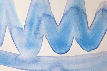 Elementi astratti realizzati ad acquerello: pennellate blu dipinte su carta 