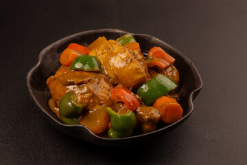 Chicken Caldereta or Kalderetang Manok Is Filipino Stew Chicken in Spicy Tomato Sauce with Liver Paste.