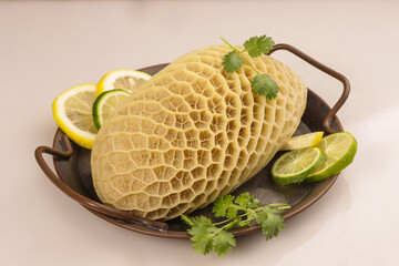 Honeycomb Tripe, Beef Second Stomach on a Rustic Plate.