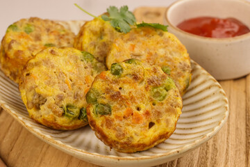 Tortang Giniling is a Filipino Ground Beef Omelette, Like a Fritter, Filled with Ground Beef and Veggies.