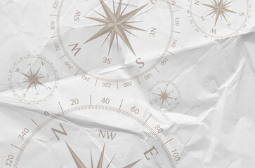 Fototapeta na wymiar compass icon on paper background 