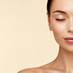 Half of the face beauty cropped portrait of the model with a perfect skin s looking at camera...