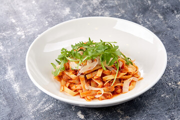 pasta bolognese on the white plate