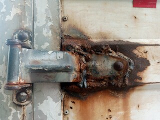 Rusty white metal door. rusty iron texture. Suitable for rusty background themes