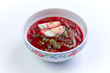 cold beetroot soup on the white background