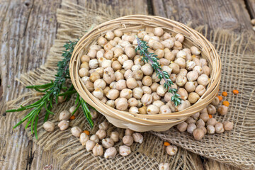 chickpeas in a basket and fresh herbs