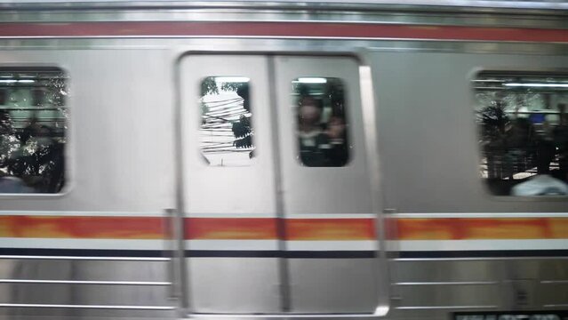 Close up for windows of subway train passing fast shot in 4K
