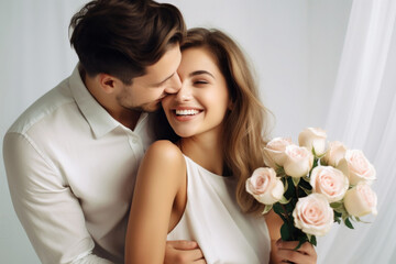 beautiful young couple in love girl model with a young man with a bouquet of flowers, international women's day, warm relationship care and attention