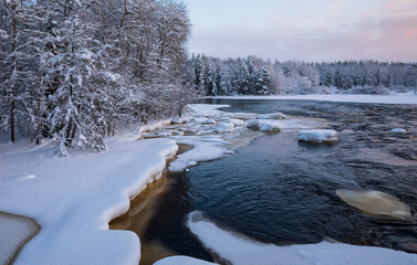 dawn on snowy river in winter - 723723336
