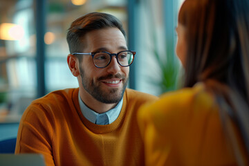 Obraz premium Happy businesswoman interviewing a well-prepared job candidate in a cozy office environment. The job interview process - from expectation to excitement, captured in high-definition
