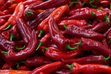 fresh organic red pepper from farm close up from different angle, green paprika in the grocery store - Powered by Adobe