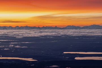 Fototapeta premium Colourful morning sky with Cirrus clouds above Swiss Alps