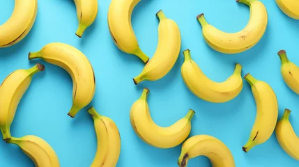 Tuinposter Banana - yellow fruit on a blue background © 4memorize