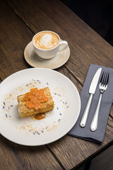 A delicious honey cake in a restaurant. Close up
