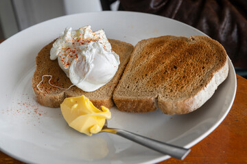 Poached egg on toast. Breakfast. New Zealand. Food.
