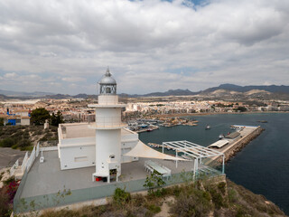 Fototapeta na wymiar Faro del Puerto de Mazarron en Murcia