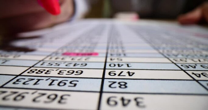 Bank document errors numbers marked with red marker closeup