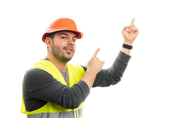 Friendly constructor pointing index fingers at blank copyspace