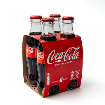 Milan Italy January 22, 2023. Cardboard pack of 4 200ml Coca Cola bottles. White background