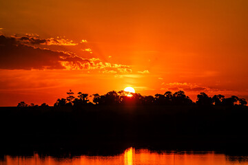 Obraz premium sunset over the lake