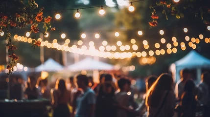 Fototapeten Blurred image of street food festival with bokeh lights . © Art AI Gallery
