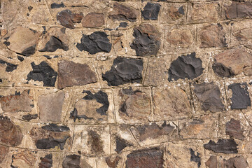 Ancient stone wall. Stone texture.