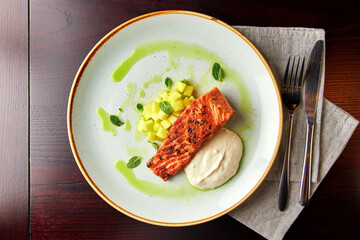 Griled Salmon with Apple Garnish and Mint Sauce. - 723815747