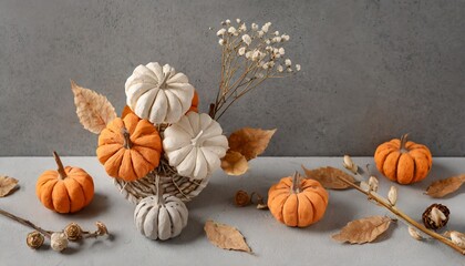 composition of handmade plaster pumpkins autumn seasonal holidays background in natural colors diy craft gypsum pumpkins for helloween thanksgiving fall decoration