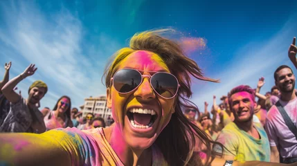 Fototapeten Colored girl laughs at Holi festival. Young indian girl smiling with dry or gulal or abeer or Holi powder on her face and clothers. Concept Indian color Organic Gulal festival. Hindu tradition  © alesia0604