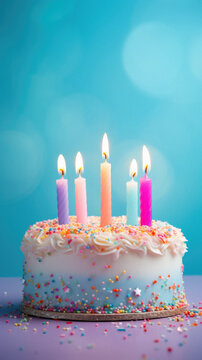 Birthday cake with burning candles on blue background. Selective focus .