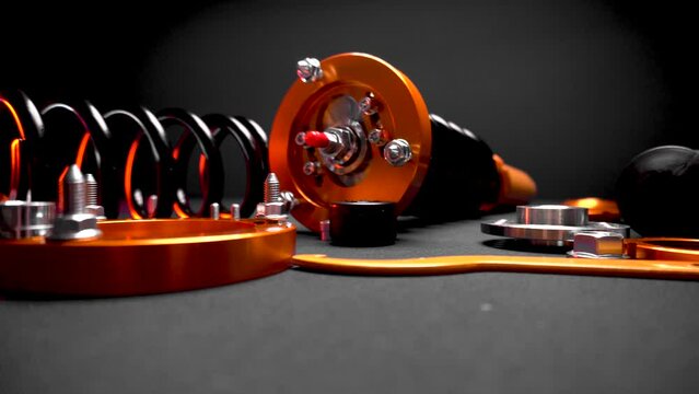 suspension tuning, coilovers, shock absorbers and front springs in yellow and gold colors for a sports drift car on a dark background