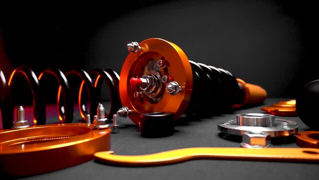 suspension tuning, coilovers, shock absorbers and front springs in yellow and gold colors for a sports drift car on a dark background