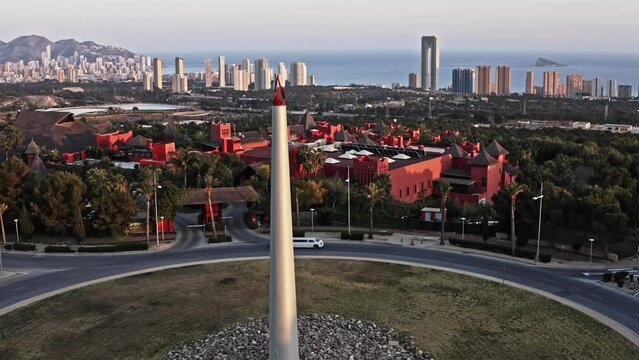 City aerial view with limousine driving foreground